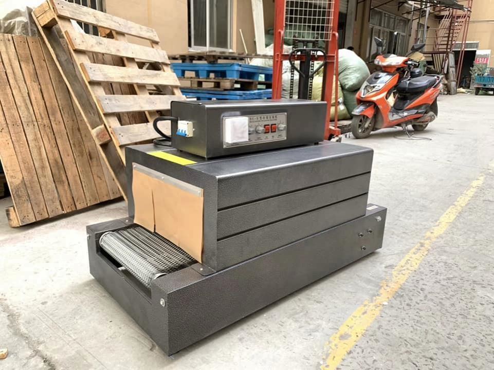 핫 세일 소형 플라스틱 필름 열 터널 수축 절단 포장 기계 (병/상자용) - 작동 용이