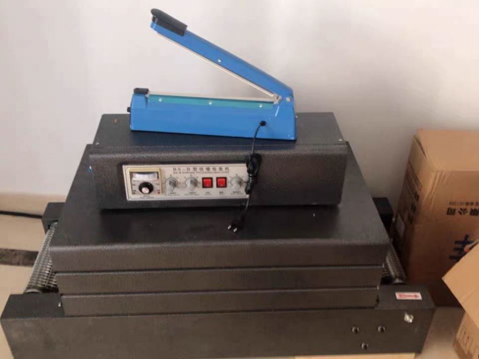 핫 세일 소형 플라스틱 필름 열 터널 수축 절단 포장 기계 (병/상자용) - 작동 용이